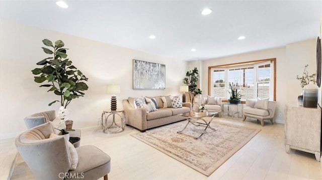 16001 Ballantine Ln, Huntington Beach, CA 92647 - living area featuring recessed lighting and light wood-style floors