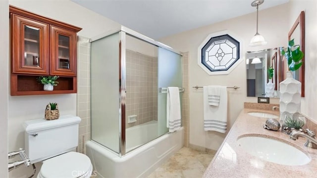16001 Ballantine Ln, Huntington Beach, CA 92647 - full bathroom with combined bath / shower with glass door, double vanity, and tile patterned flooring