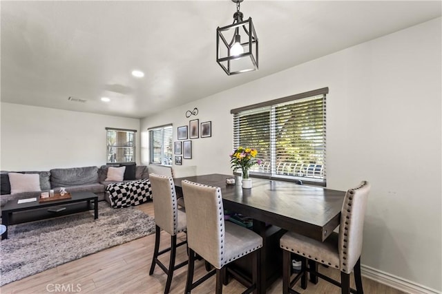 11415 216th St Unit 24, Lakewood, CA 90715 - dining room with visible vents, wood finished floors, and recessed lighting