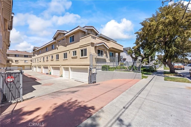 11415 216th St Unit 24, Lakewood, CA 90715 - view of road featuring sidewalks and a residential view