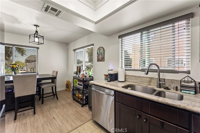 11415 216th St Unit 24, Lakewood, CA 90715 - kitchen featuring dark brown cabinets, dishwasher, visible vents, a sink, and hanging light fixtures