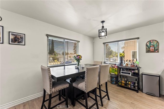 11415 216th St Unit 24, Lakewood, CA 90715 - dining space featuring light wood-style flooring and baseboards