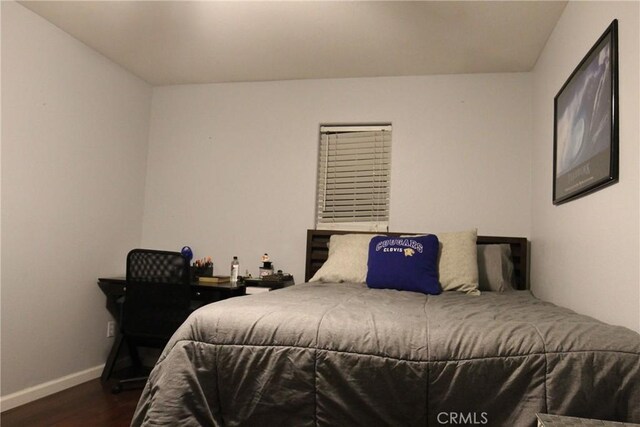 2653 Ashcroft Ave, Clovis, CA 93611 - bedroom with dark wood-style floors and baseboards