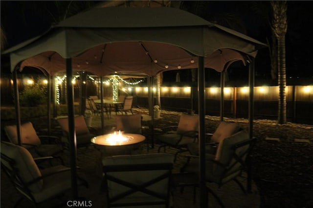 2653 Ashcroft Ave, Clovis, CA 93611 - patio at night featuring a fire pit