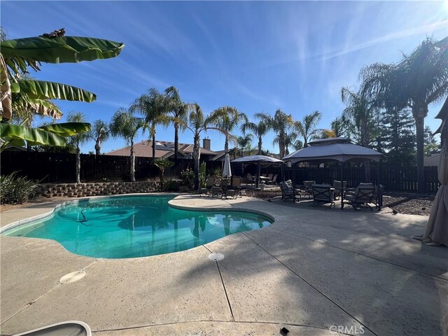 2653 Ashcroft Ave, Clovis, CA 93611 - view of pool featuring a fenced in pool, a fenced backyard, and a patio area