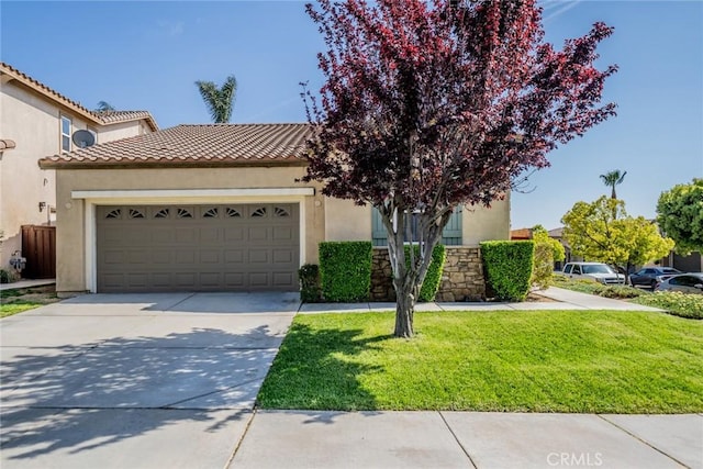36877 Meadow Brook Way, Beaumont, CA 92223 - view of front facade with a garage, driveway, and stucco siding