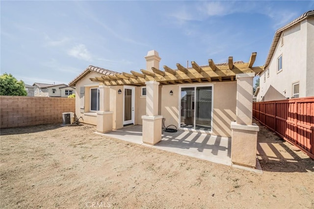 36877 Meadow Brook Way, Beaumont, CA 92223 - back of house with central air condition unit, a patio, a pergola, a fenced backyard, and stucco siding