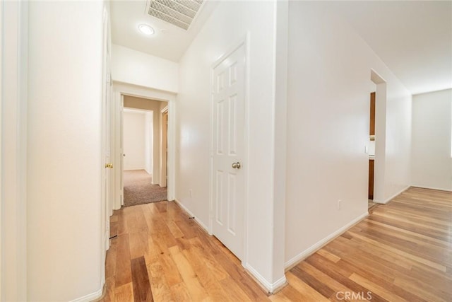 36877 Meadow Brook Way, Beaumont, CA 92223 - hallway featuring light wood-type flooring and baseboards