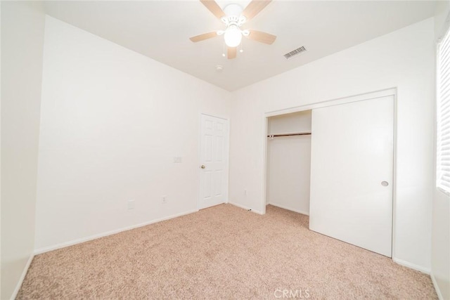 36877 Meadow Brook Way, Beaumont, CA 92223 - unfurnished bedroom featuring light carpet, a closet, baseboards, and ceiling fan