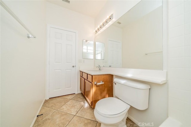 36877 Meadow Brook Way, Beaumont, CA 92223 - bathroom with vanity, toilet, tile patterned floors, and baseboards