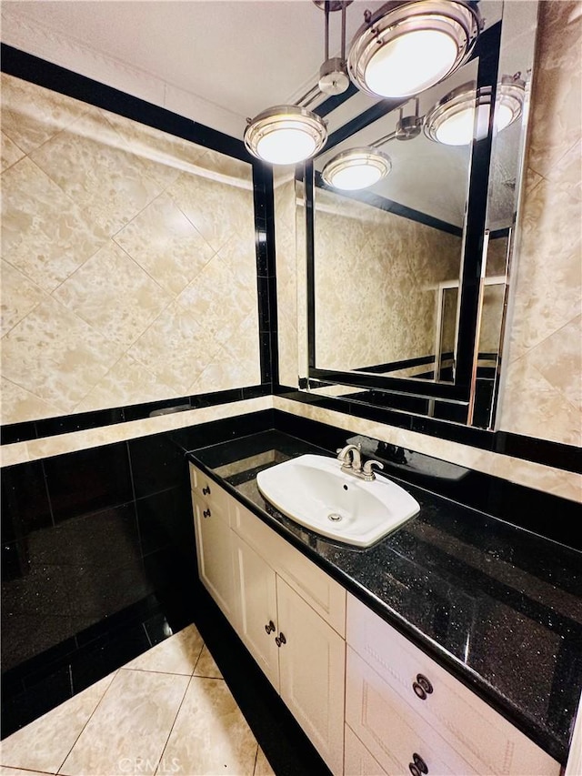 6225 Coldwater Canyon Ave Unit 117, North Hollywood, CA 91606 - bathroom with tile walls, vanity, and tile patterned flooring