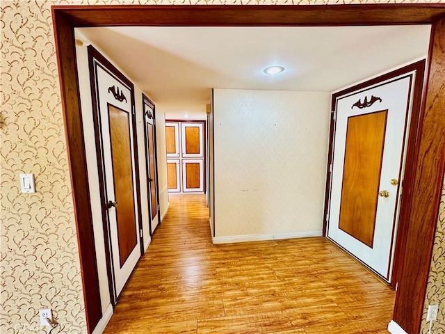 6225 Coldwater Canyon Ave Unit 117, North Hollywood, CA 91606 - corridor featuring wallpapered walls and light wood-type flooring
