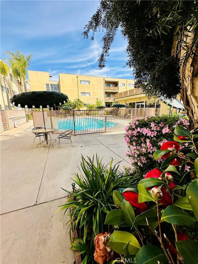 6225 Coldwater Canyon Ave Unit 117, North Hollywood, CA 91606 - community pool featuring a patio area and fence