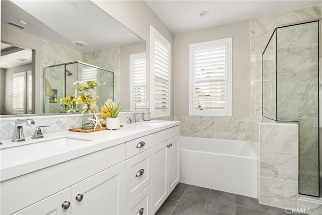 109 Baculo St, Rancho Mission Viejo, CA 92694 - full bathroom featuring a bath, visible vents, a stall shower, and a sink