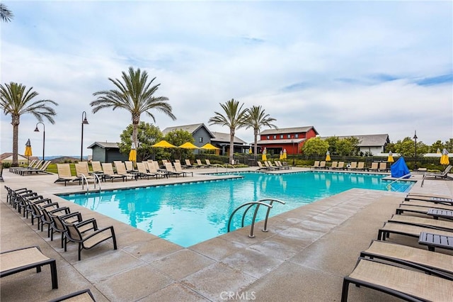 109 Baculo St, Rancho Mission Viejo, CA 92694 - community pool with fence and a patio area