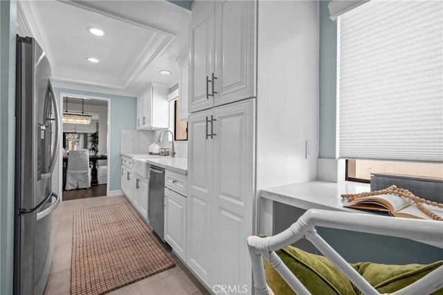 2357 Palos Verdes Dr W Unit 3, Palos Verdes Estates, CA 90274 - kitchen featuring a sink, ornamental molding, a healthy amount of sunlight, and appliances with stainless steel finishes