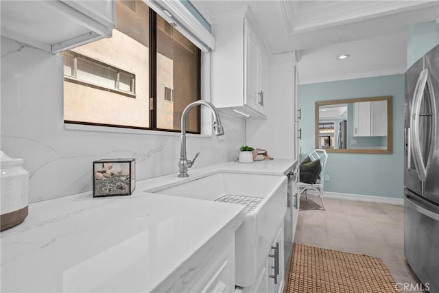 2357 Palos Verdes Dr W Unit 3, Palos Verdes Estates, CA 90274 - kitchen with a sink, freestanding refrigerator, light stone counters, crown molding, and white cabinetry