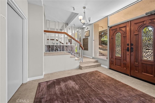 2357 Palos Verdes Dr W Unit 3, Palos Verdes Estates, CA 90274 - entrance foyer featuring stairway, tile patterned floors, and an inviting chandelier