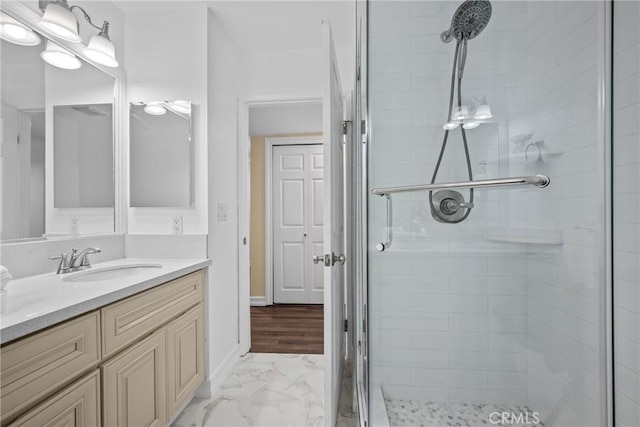2357 Palos Verdes Dr W Unit 3, Palos Verdes Estates, CA 90274 - full bathroom featuring a stall shower, vanity, baseboards, and marble finish floor