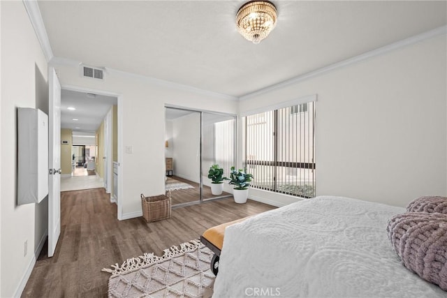 2357 Palos Verdes Dr W Unit 3, Palos Verdes Estates, CA 90274 - bedroom featuring a closet, wood finished floors, ornamental molding, visible vents, and baseboards