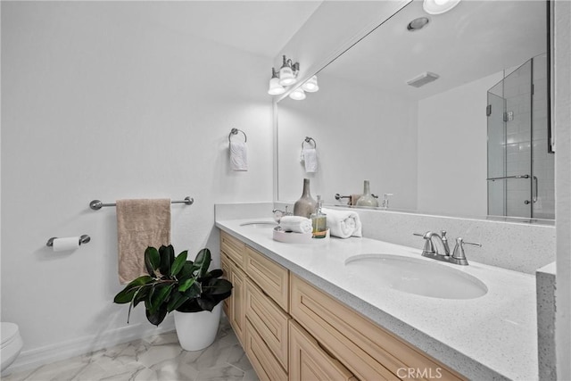 2357 Palos Verdes Dr W Unit 3, Palos Verdes Estates, CA 90274 - bathroom featuring double vanity, toilet, a stall shower, a sink, and marble finish floor