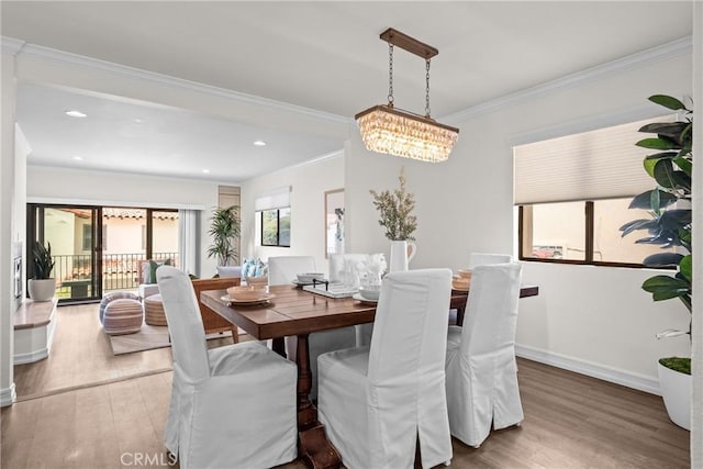 2357 Palos Verdes Dr W Unit 3, Palos Verdes Estates, CA 90274 - dining room featuring a notable chandelier, recessed lighting, baseboards, crown molding, and wood finished floors