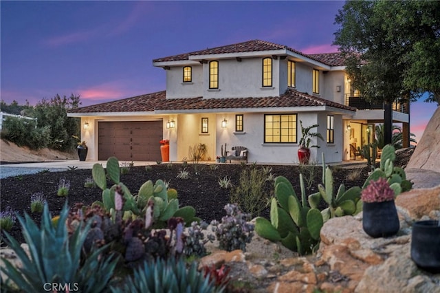 41950 Hacienda Dr, Murrieta, CA 92562 - mediterranean / spanish home featuring stucco siding, an attached garage, and concrete driveway