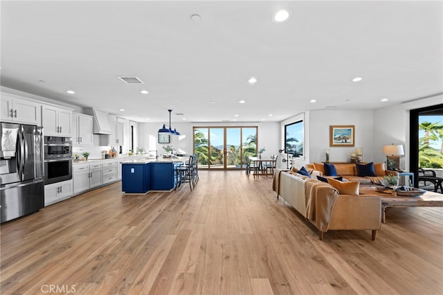 41950 Hacienda Dr, Murrieta, CA 92562 - living room featuring recessed lighting and light wood finished floors