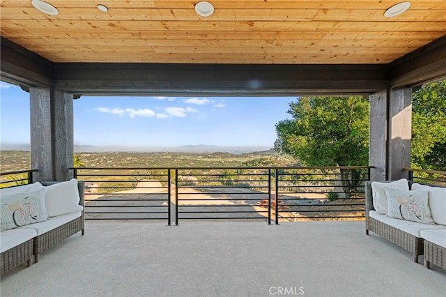 view of patio / terrace with a mountain view