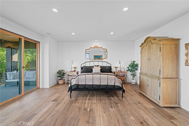 bedroom featuring light wood finished floors, access to outside, baseboards, and recessed lighting