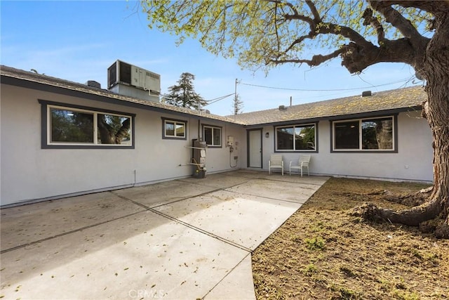 513 River Oaks Dr, Bakersfield, CA 93309 - view of front facade featuring roof with shingles, a patio, and stucco siding