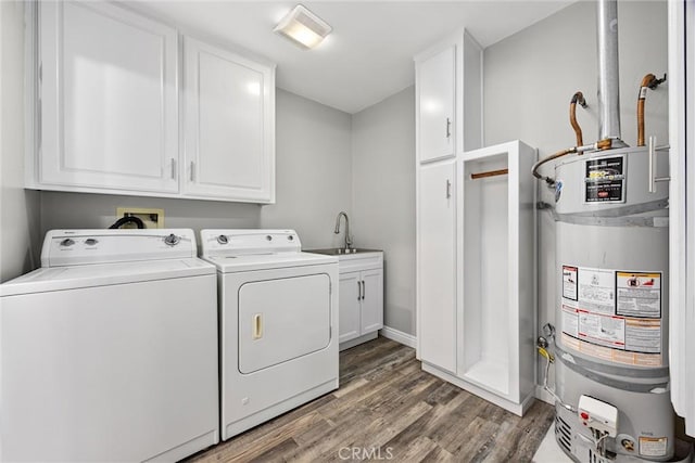 513 River Oaks Dr, Bakersfield, CA 93309 - laundry area with a sink, washing machine and dryer, secured water heater, wood finished floors, and cabinet space