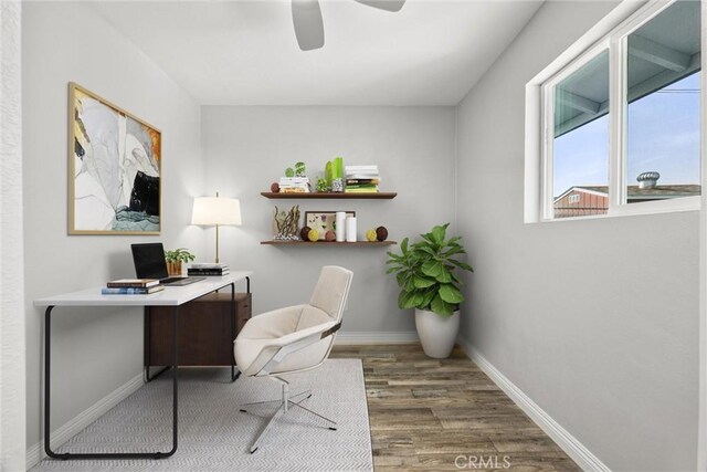 513 River Oaks Dr, Bakersfield, CA 93309 - home office with ceiling fan, baseboards, and wood finished floors