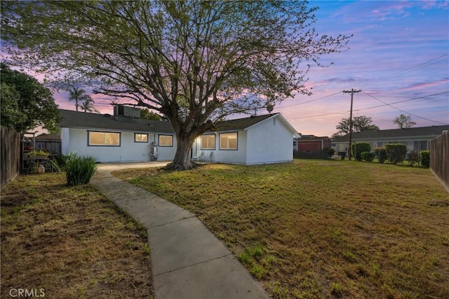 513 River Oaks Dr, Bakersfield, CA 93309 - ranch-style house with a front yard and fence