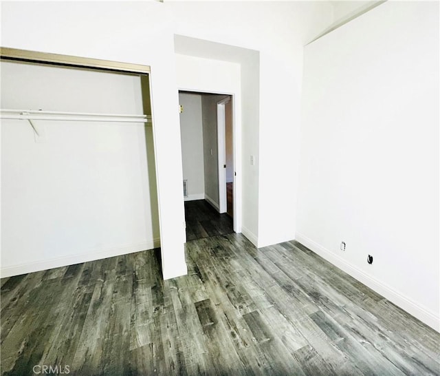 22703 Copper Hill Dr Unit 2, Saugus, CA 91350 - unfurnished bedroom featuring baseboards, wood finished floors, and a closet