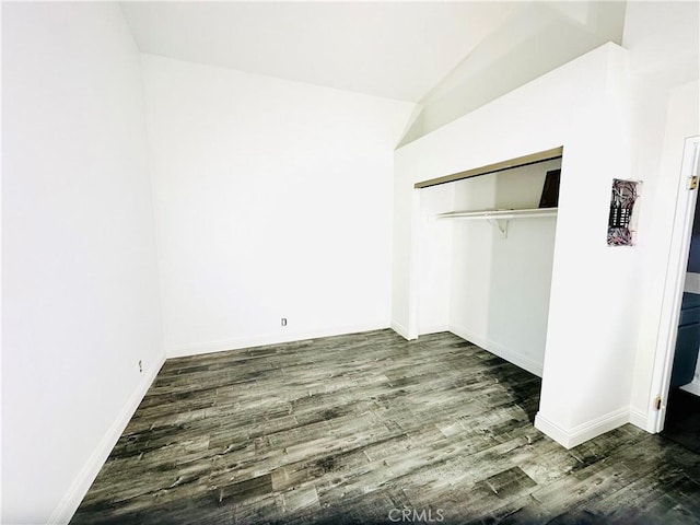 22703 Copper Hill Dr Unit 2, Saugus, CA 91350 - unfurnished bedroom featuring baseboards, dark wood-style floors, and a closet