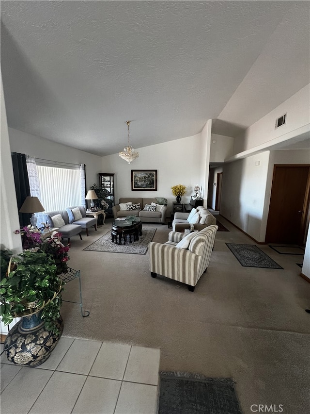 16389 Viho Ct, Apple Valley, CA 92307 - living area featuring lofted ceiling, carpet floors, a chandelier, tile patterned floors, and a textured ceiling