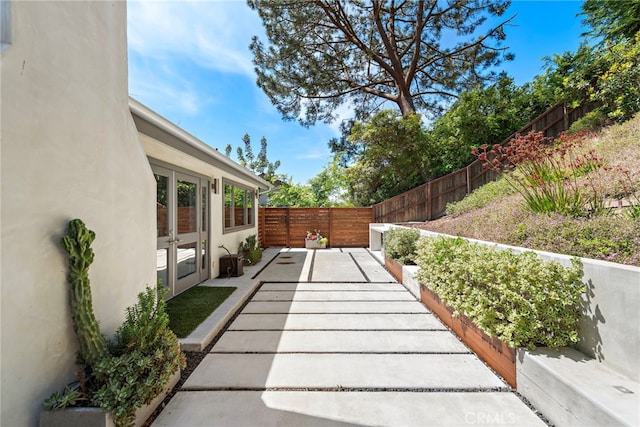 3120 Bern Dr, Laguna Beach, CA 92651 - fenced backyard featuring a patio and french doors