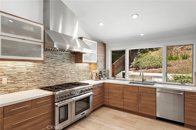3120 Bern Dr, Laguna Beach, CA 92651 - kitchen featuring stainless steel appliances, wall chimney exhaust hood, modern cabinets, light countertops, and recessed lighting