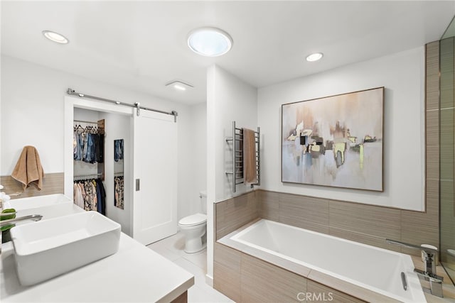 3120 Bern Dr, Laguna Beach, CA 92651 - bathroom featuring a garden tub, vanity, tile patterned floors, and recessed lighting