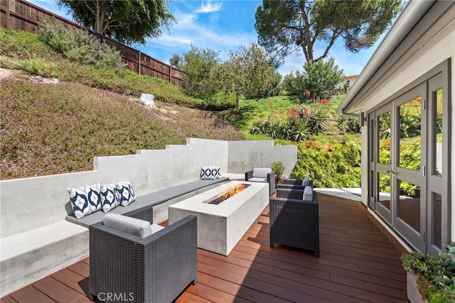3120 Bern Dr, Laguna Beach, CA 92651 - wooden terrace with an outdoor living space with a fire pit and french doors