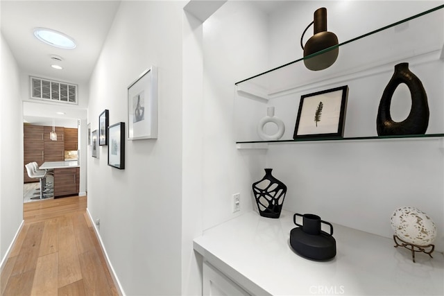 3120 Bern Dr, Laguna Beach, CA 92651 - corridor featuring light wood finished floors and recessed lighting