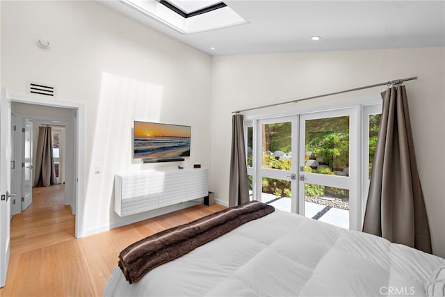 3120 Bern Dr, Laguna Beach, CA 92651 - bedroom with a skylight, wood finished floors, a towering ceiling, and recessed lighting