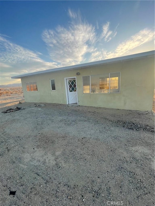 view of front of home with stucco siding