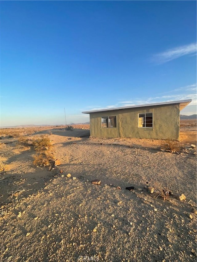 view of front of house with stucco siding