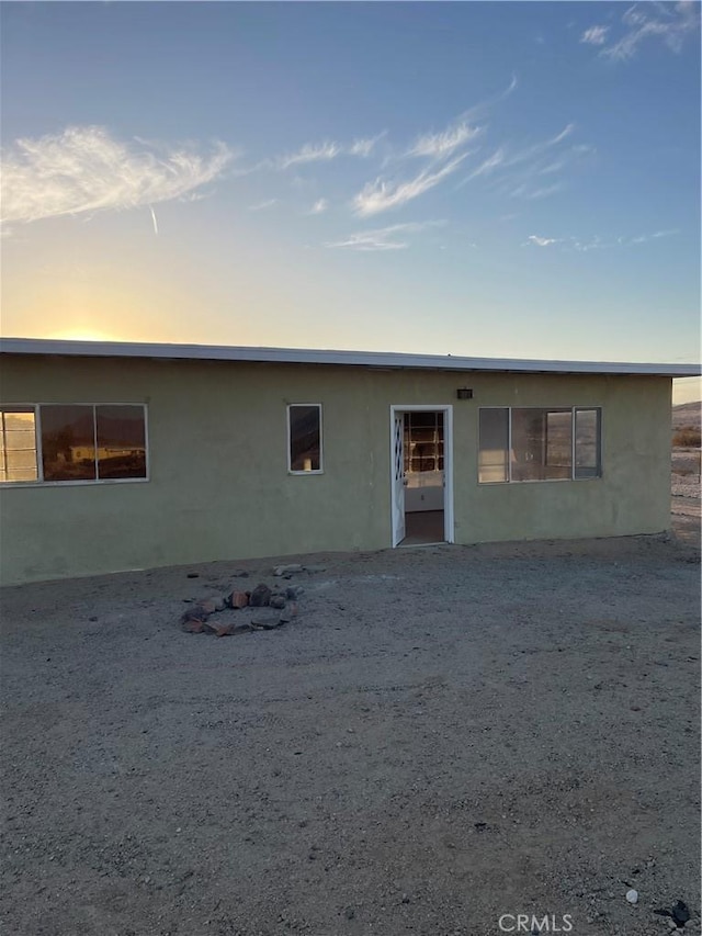 view of front facade featuring stucco siding