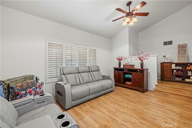 21643 Spice Ct, Saugus, CA 91350 - living room with ceiling fan, light wood-style floors, and high vaulted ceiling