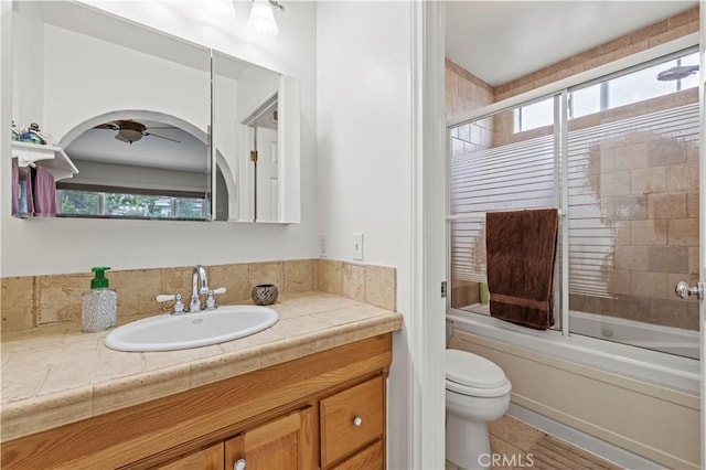 21643 Spice Ct, Saugus, CA 91350 - bathroom with vanity, healthy amount of natural light, bath / shower combo with glass door, and ceiling fan