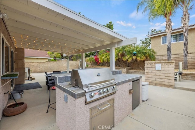 21643 Spice Ct, Saugus, CA 91350 - view of patio featuring exterior kitchen