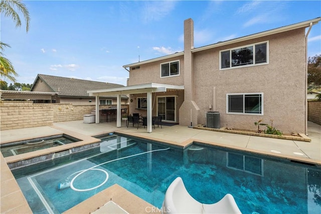 21643 Spice Ct, Saugus, CA 91350 - view of swimming pool with a water slide, a patio, and a pool with connected hot tub